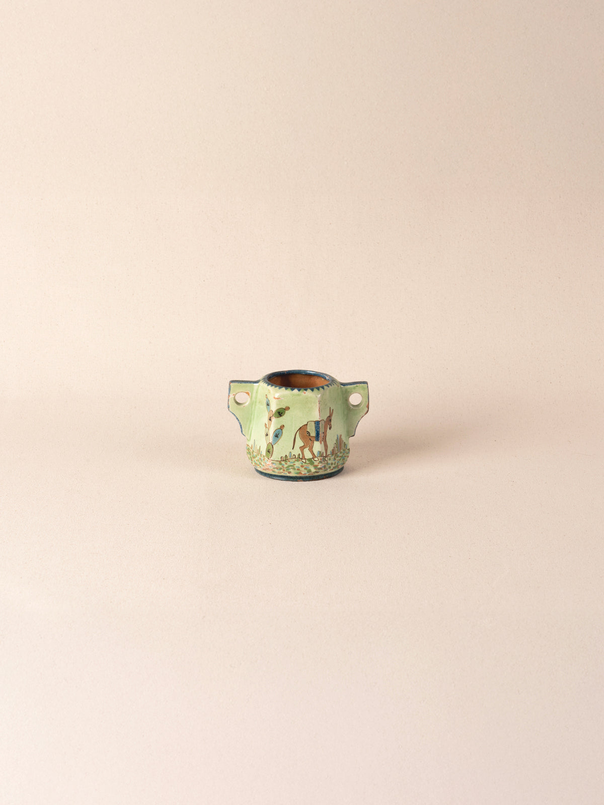 Vintage green Oaxacan ceramic milk cup with colorful painted decoration