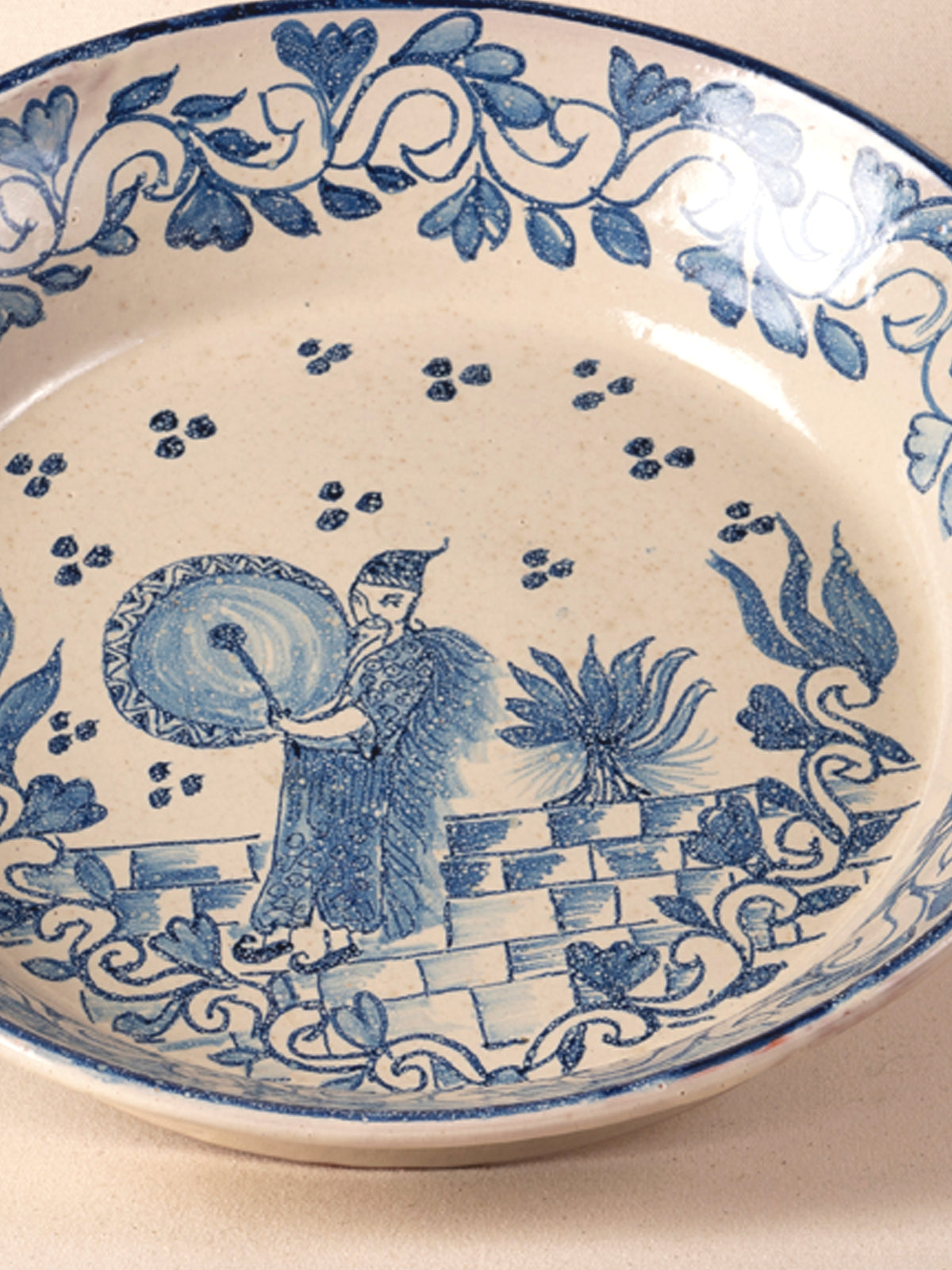 Hand-painted vintage Mexican round ceramic dish with a blue design