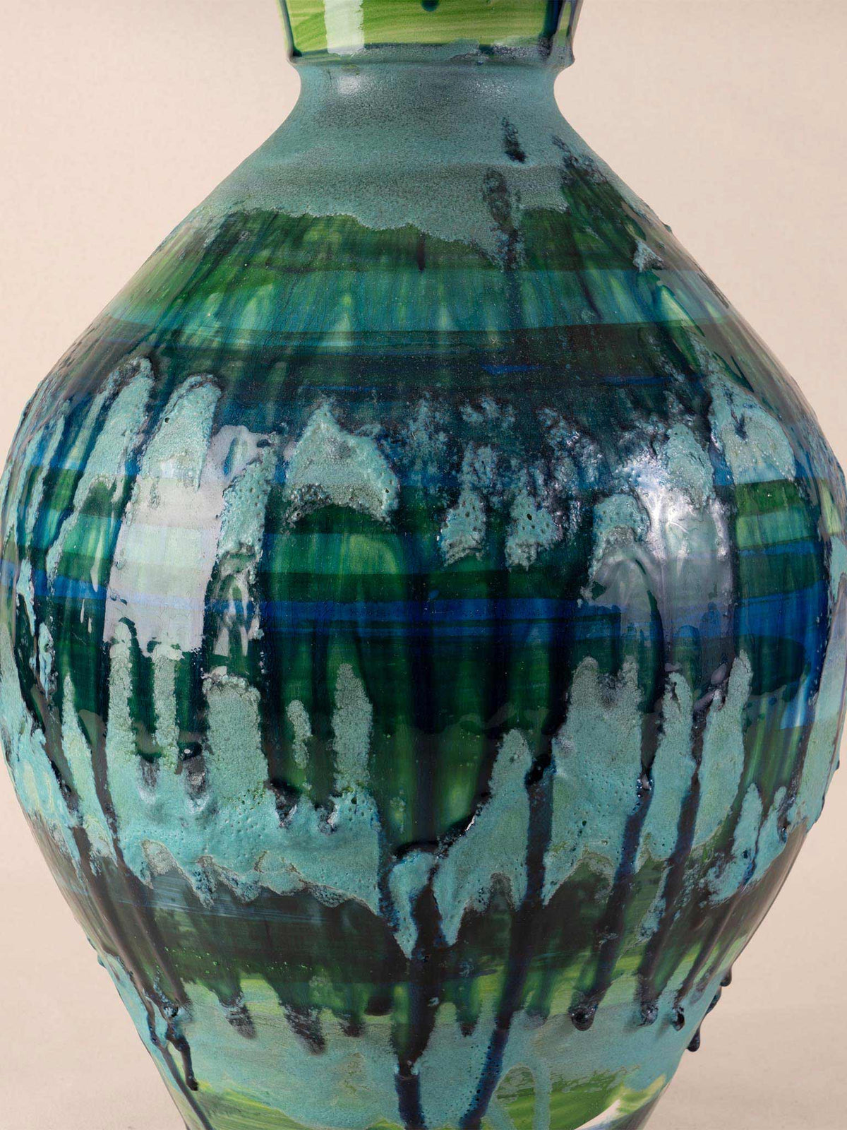Mid-century ceramic table lamp with blue-green drip glaze on a wood plinth with burlap drum shade