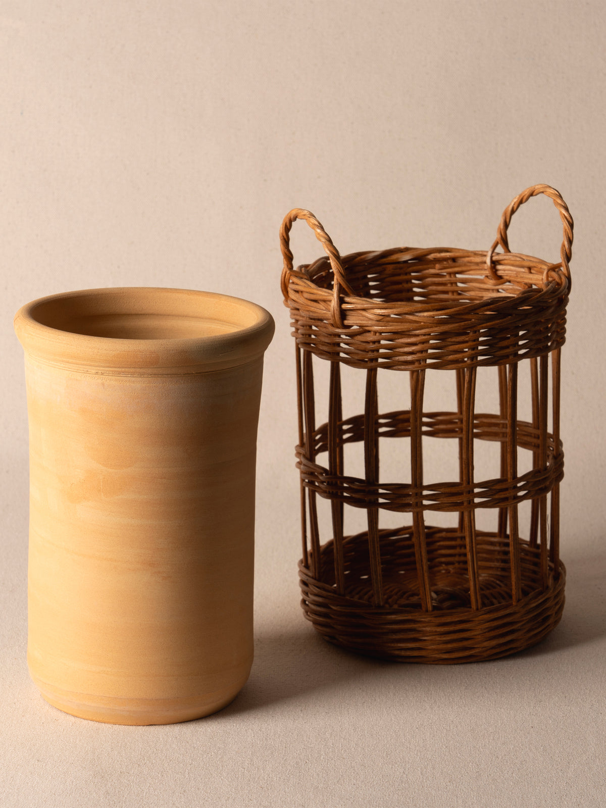 Terracotta wine cooler wrapped in wicker by Mith Copenhagen