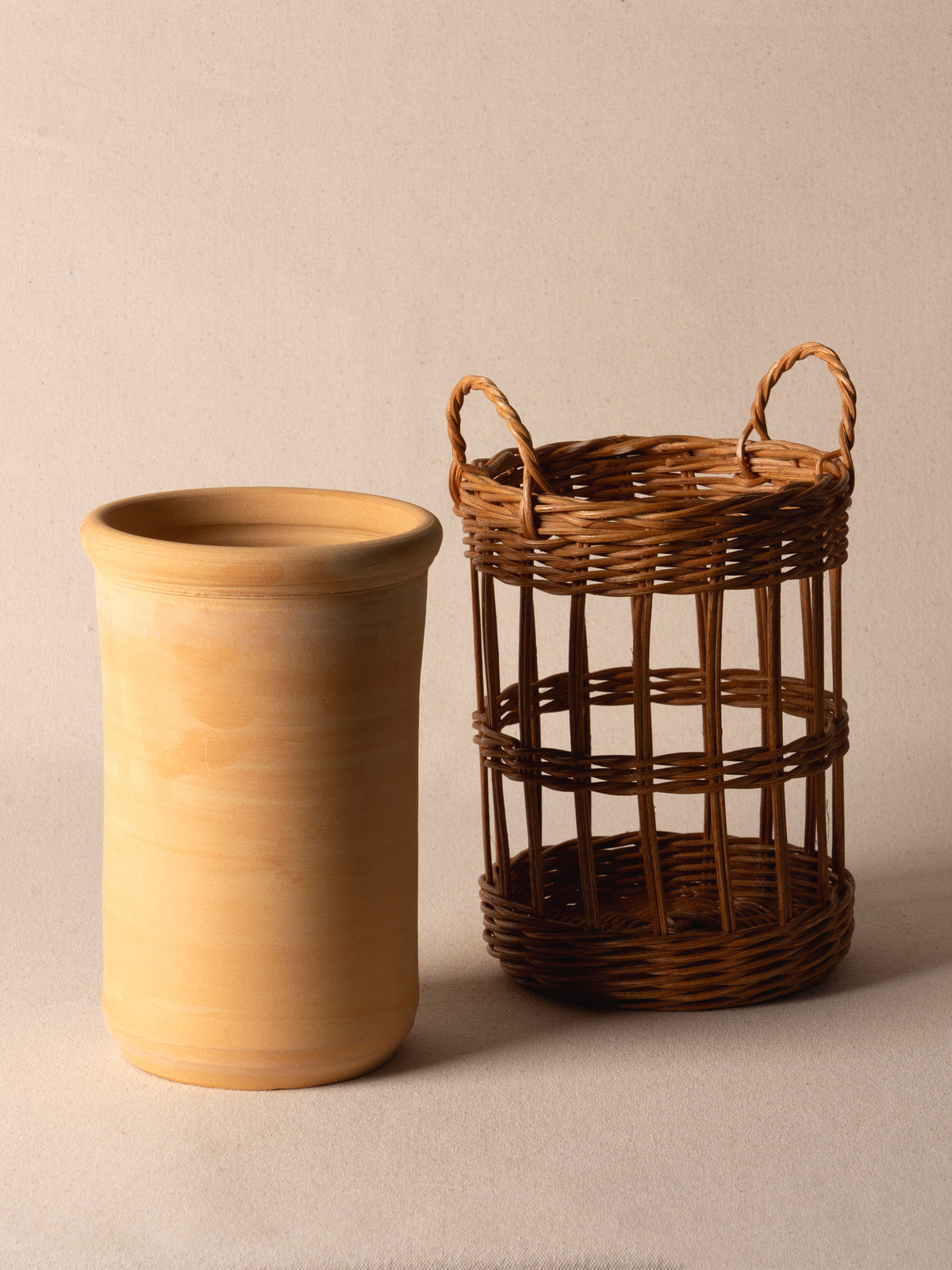 Terracotta wine cooler wrapped in wicker by Mith Copenhagen