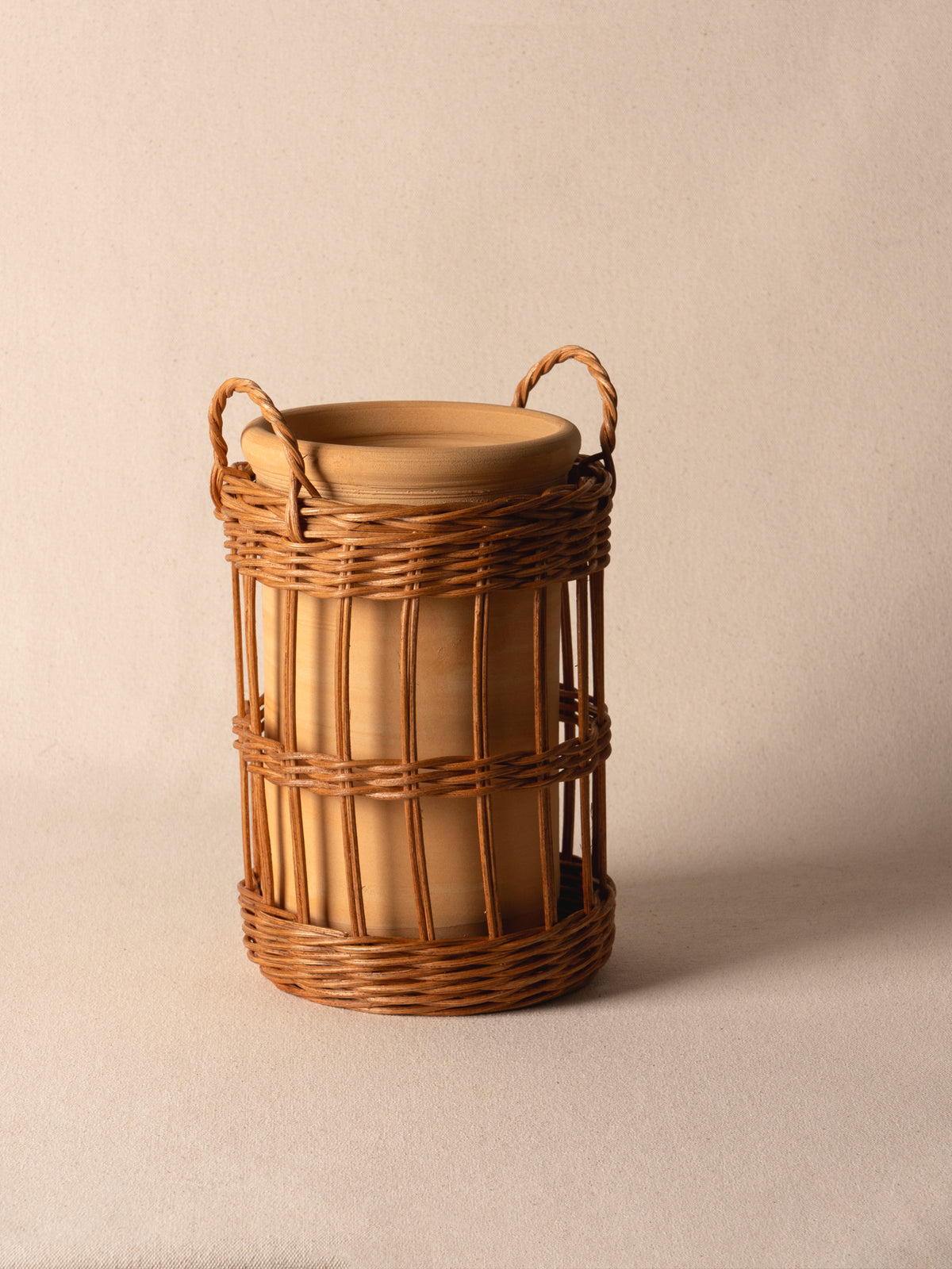 Terracotta wine cooler wrapped in wicker by Mith Copenhagen