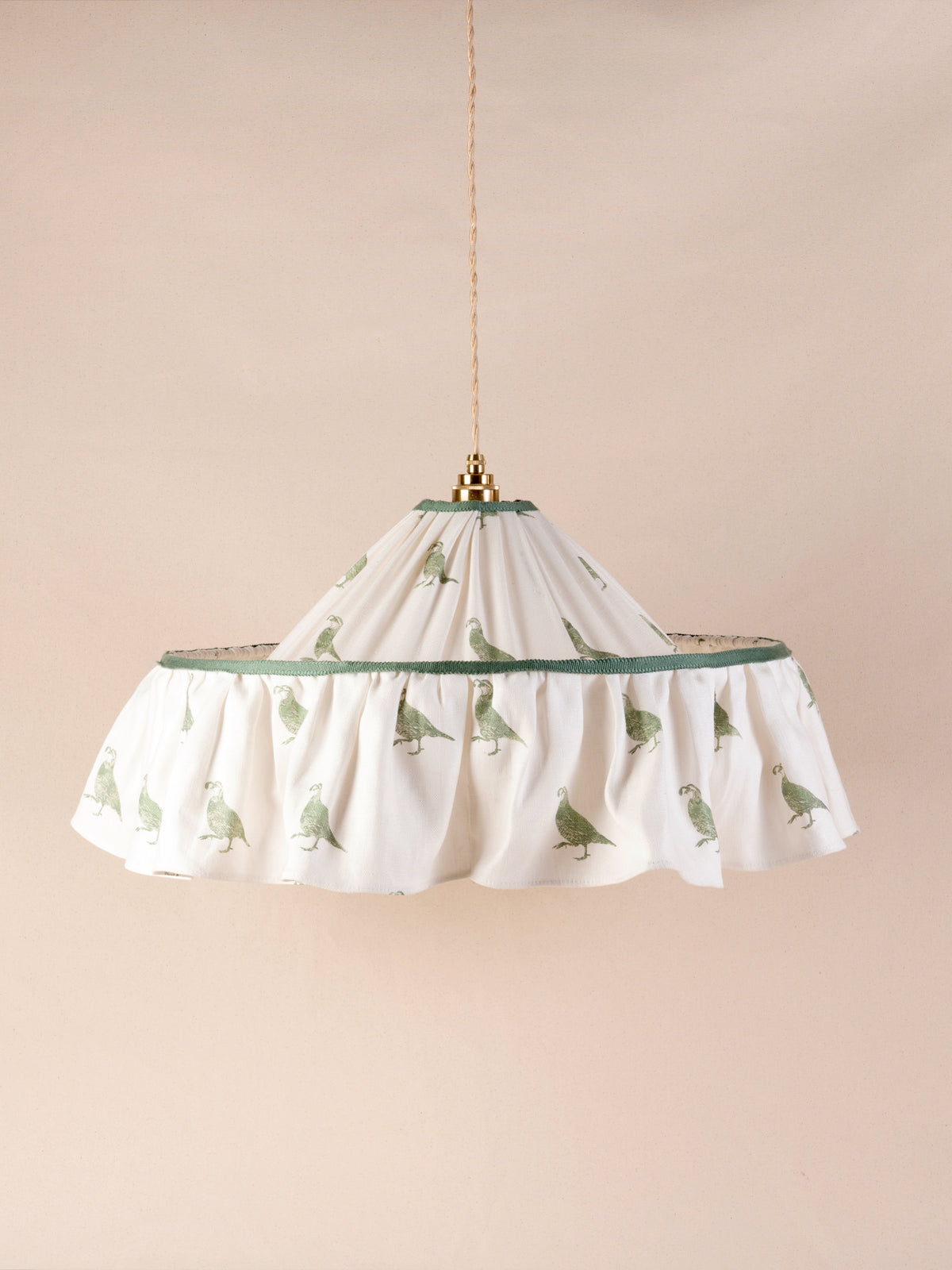 Small ruffled pendant light with a pleated green California Quail print linen shade