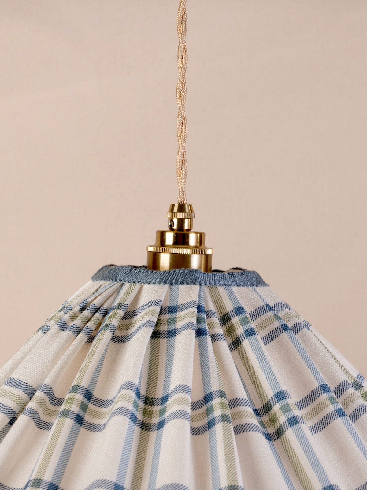 Small ruffled pendant light with blue and green Roger Plaid linen shade and blue trim