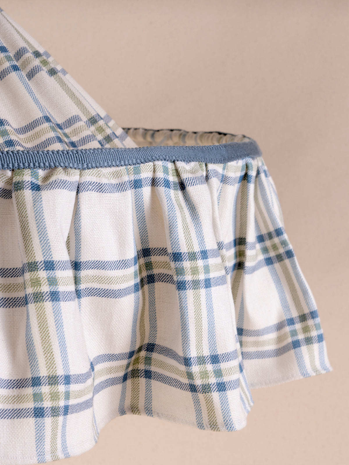 Small ruffled pendant light with blue and green Roger Plaid linen shade and blue trim