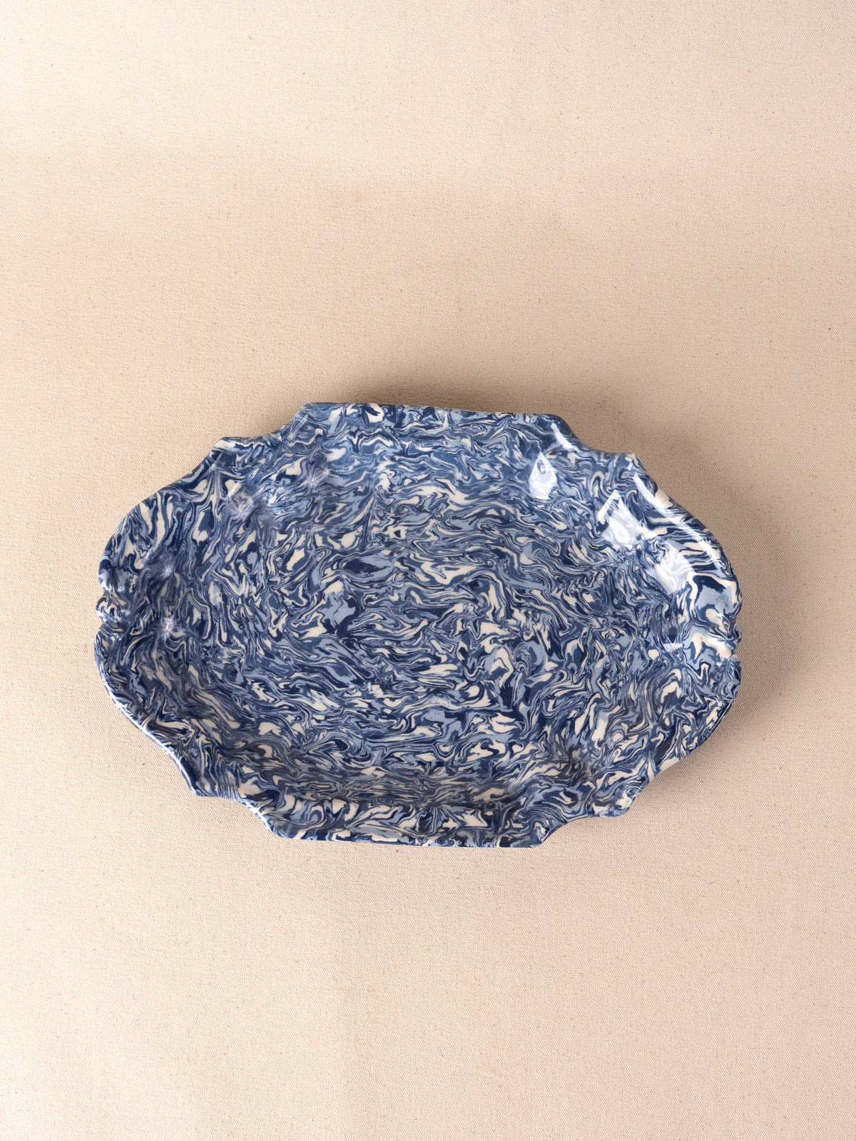 Blue and white marbled oval ceramic platter by Pascale Mestre