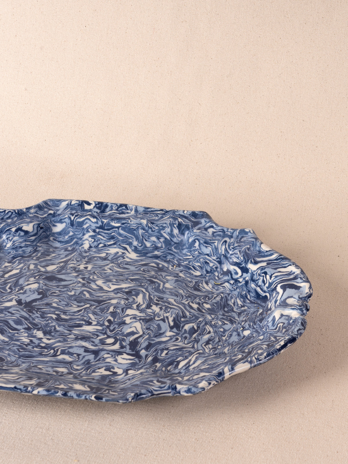 Blue and white marbled oval ceramic platter by Pascale Mestre