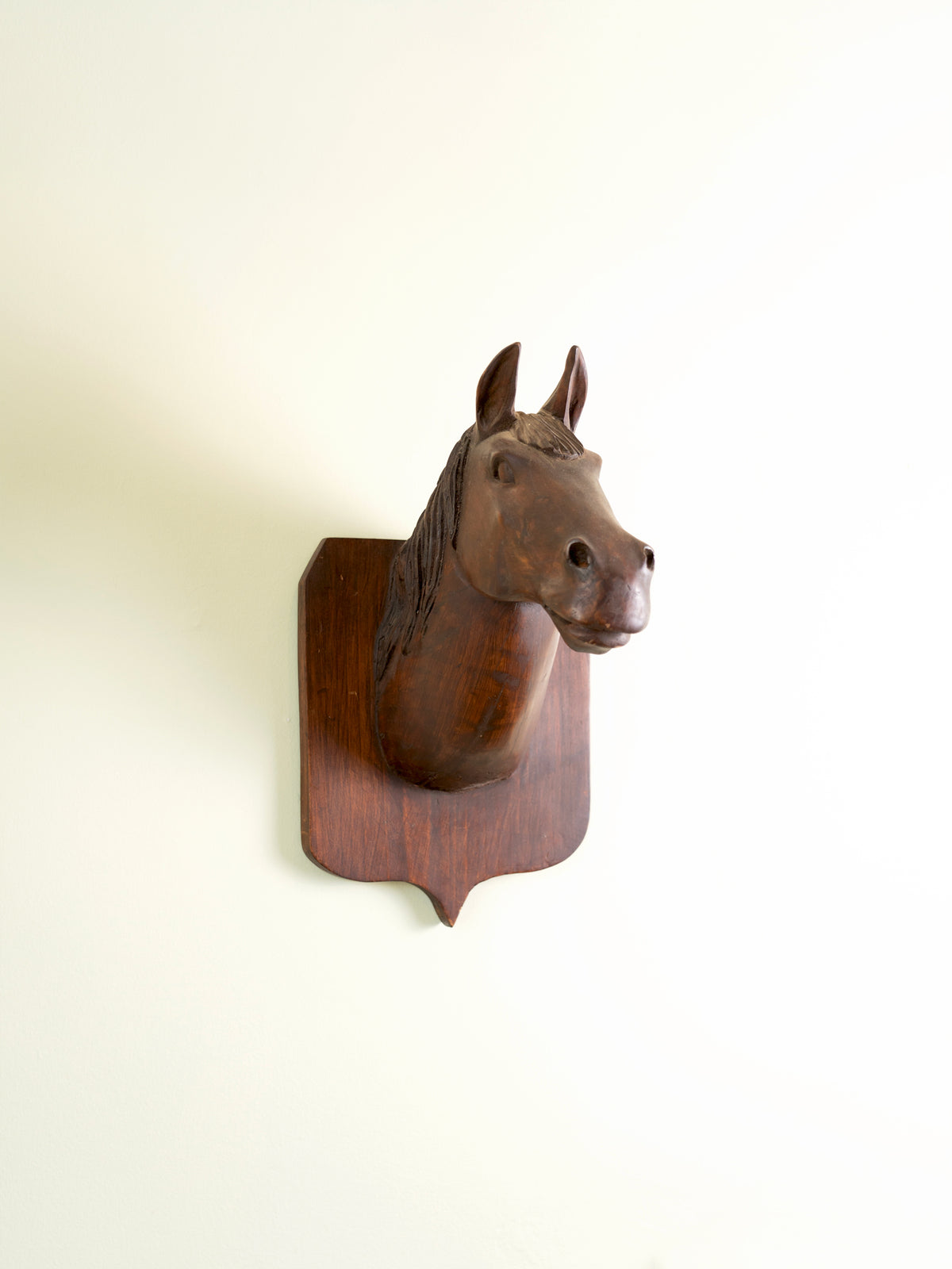 Vintage wooden horse head bust mounted for the wall