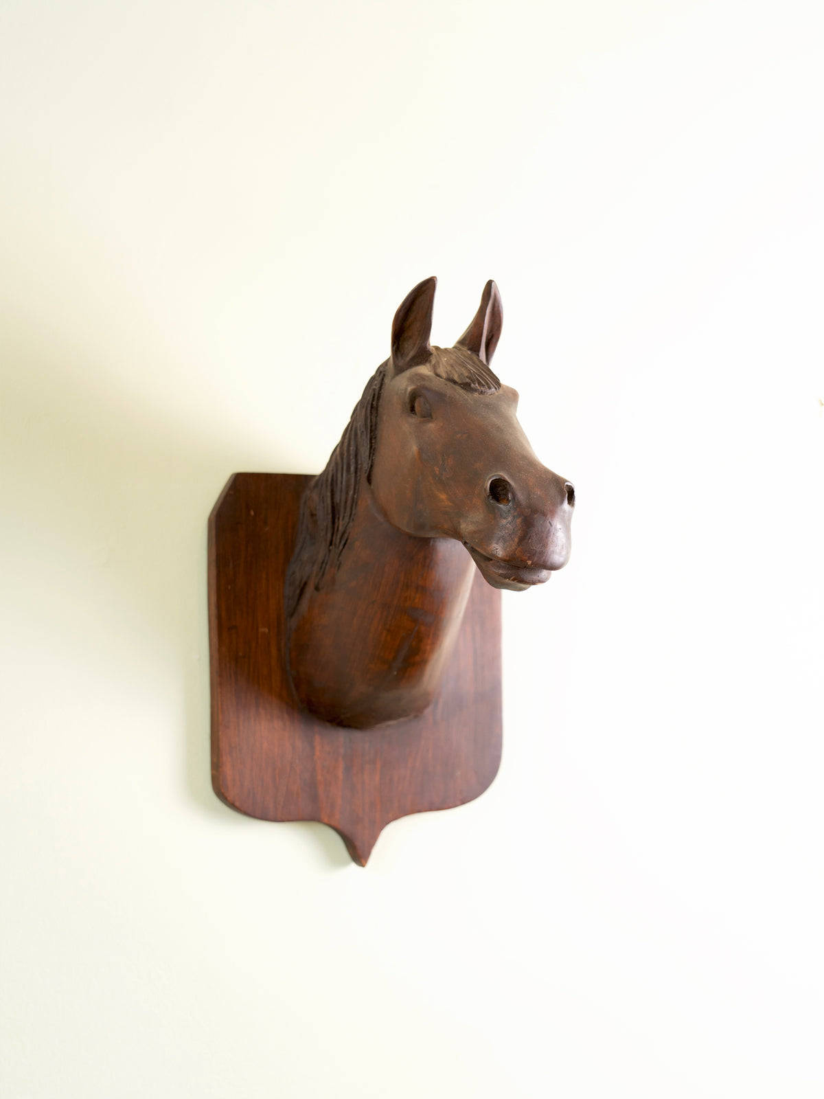 Vintage wooden horse head bust mounted for the wall