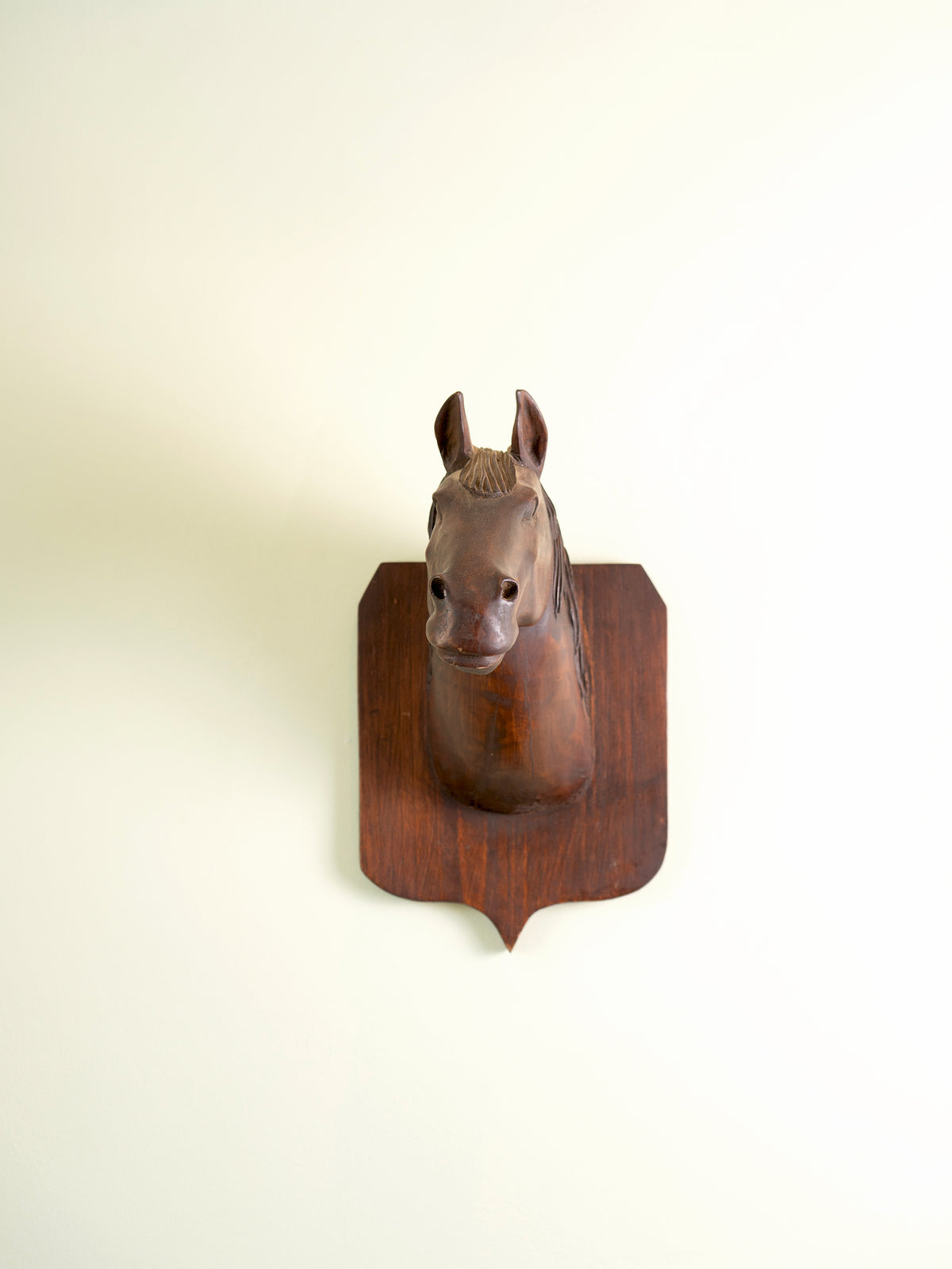 Vintage wooden horse head bust mounted for the wall