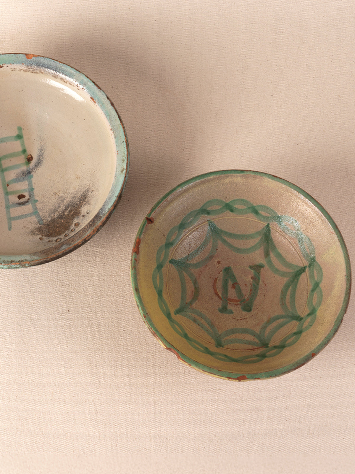 Pair of antique green ceramic Peruvian bowls